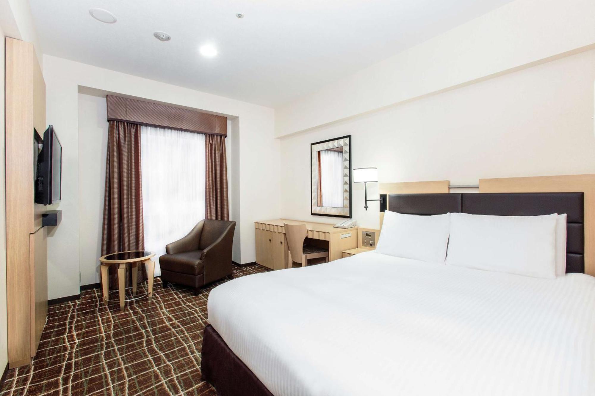 Отель Doubletree By Hilton Наха Экстерьер фото